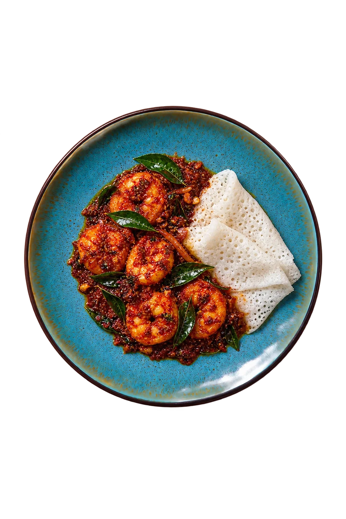 Lotus dinnerware serving prawn ghee roast with fresh curry leaves and a small neer-dosa fold.